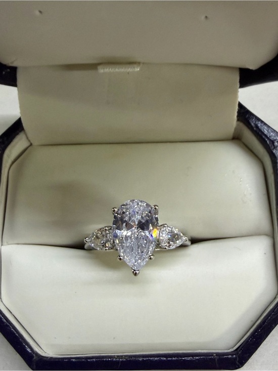 Jewelry - Pear-Shaped White Cubic Zirconia Three-Stone Ring in Silver Tone
